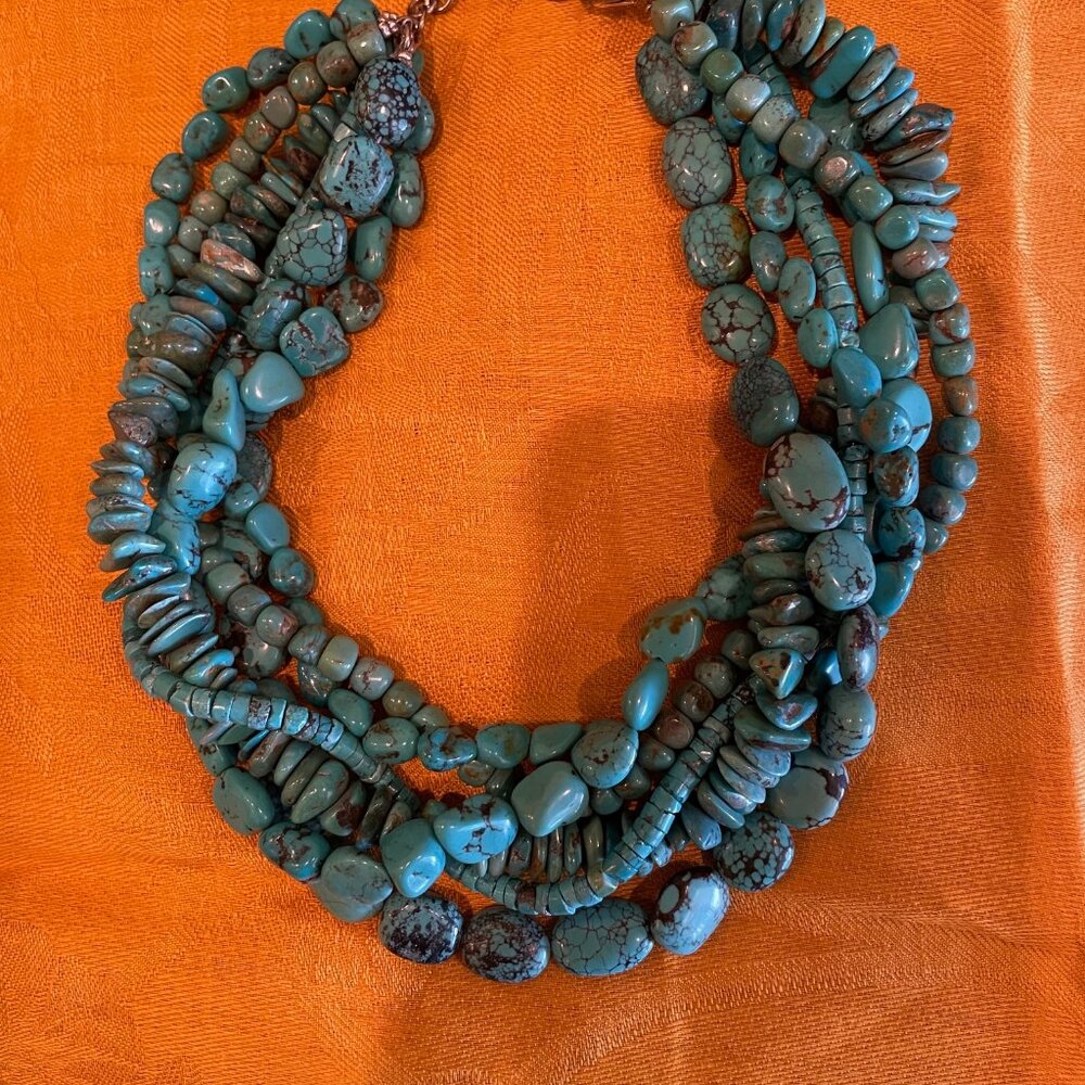 19-inch, six-strand turquoise necklace.  Lots of personality!